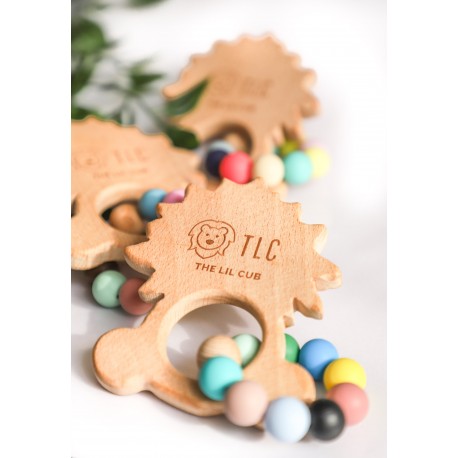 Wooden teether with silicone beads